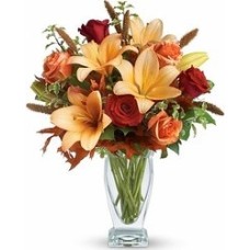 Vase with red lilium, roses, marg. and ocher tones alstromerias